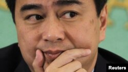 Former Thai Prime Minister Abhisit Vejjajiva attends a news conference at the Japan National Press Club in Tokyo, March 2, 2012.