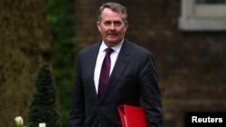 FILE - Britain's Secretary of State for International Trade, Liam Fox arrives for a Brexit subcommittee meeting at Downing Street in London, Britain, May 2, 2018. 