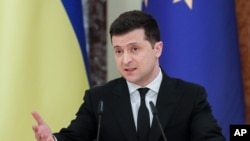 Ukraine's President Volodymyr Zelenskiy sought a meeting with Putin after the two countries traded blame over a spike in clashes in the Donbass conflict and a build-up of Russian troops near Ukraine's eastern border and in annexed Crimea.