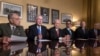From left, Senate Judiciary Committee Chairman Chuck Grassley, R-Iowa, Senate Majority Leader Mitch McConnell, R-Ky., Senate Finance Committee Chairman Orrin Hatch, R-Utah, Treasury Secretary Steven Mnuchin, President Donald Trump's top economic adviser Gary Cohn, and Sen. Rob Portman, R-Ohio, talk to reporters as work gets under way on the Senate's version of the GOP tax reform bill, on Capitol Hill in Washington, Nov. 9, 2017. 
