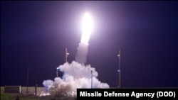 FILE - A Terminal High Altitude Area Defense (THAAD) interceptor is launched from the Pacific Spaceport Complex Alaska in Kodiak, Alaska, during Flight Test THAAD (FTT)-18, July 11, 2017. 