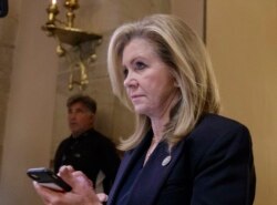 FILE - In this Oct. 26, 2017, file photo, Rep. Marsha Blackburn, R-Tenn., leaves the House chamber in Washington.