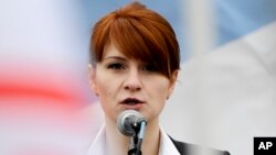 FILE - Maria Butina, leader of a pro-gun organization in Russia, speaks to a crowd during a rally in support of legalizing the possession of handguns in Moscow, Russia.