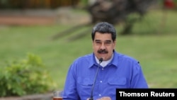 Foto de archivo del presidente en disputa Nicolás Maduro durante un evento con los jóvenes del Partido Socialista Unido de Venezuela, en Caracas.