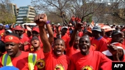 Striking petrol station attendants protest in Johannesburg, South Africa, September 9, 2013.
