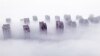 Residential buildings are shrouded in fog in Lianyungang, in eastern China's Jiangsu province, on March 12, 2025. 