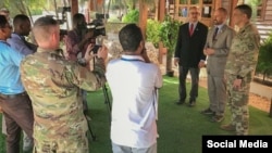 AFRICOM Commander Gen. Stephen Townsend, right, is seen with other officials during a joint media event in Mogadishu, Somalia, on a photo posted on Twitter by @USAfricaCommand, Nov. 5, 2019.