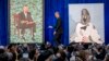 L'ancien président Barack Obama, au centre, est sur scène lors du dévoilement des portraits officiels du couple Obama à la National Portrait Gallery du Smithsonian, le 12 février 2018, à Washington.