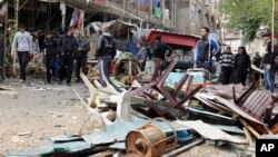 Serangan bunuh diri di sebuah cafe di Baghdad (21/11). Baghdad diguncang dengan pembunuhan gaya eksekusi terhadap 18 orang Kamis (28/11) malam. 