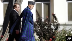 Pokiston bosh vaziri Navoz Sharif, Afg'oniston rahbari Hamid Karzay.