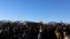 Water protectors celebrate the decision of the Army Corps to deny the building of the Dakota Access Oil Pipeline through their and sacred Sioux land (E. Sarai/VOA)