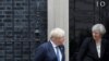 Theresa May Berusaha Bertahan Sementara Dunia Usaha Inggris Keluarkan Peringatan