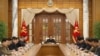 Pemimpin Korea Utara Kim Jong Un (tengah) menghadiri pertemuan biro politik Partai Buruh Korea (WPK) di Pyongyang, Korea Utara, pada 1 Desember 2021. (Foto: KCNA via Reuters