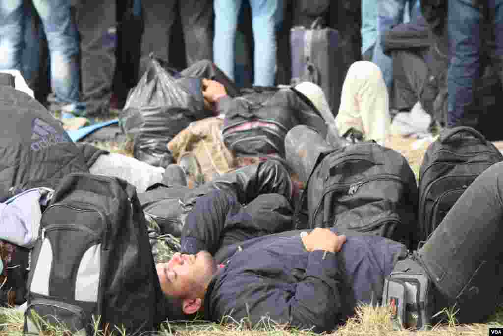 Refugees say they were exhausted when they arrived in Croatia and want to move forward through Hungary into western Europe as soon as possible, Opatovac, Croatia, Sept. 22, 2015. (Heather Murdock/VOA) 