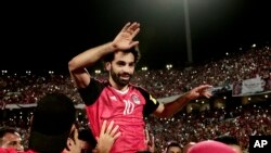 Egypt's Mohamed Salah celebrates defeating Congo during the 2018 World Cup group E qualifying soccer match at the Borg El Arab Stadium in Alexandria, Egypt, Sunday, Oct. 8, 2017. Egypt won 2-1.