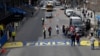 The newly applied Boston Marathon finish line rests on Boylston St., April 13, 2017, in Boston. The finish line is made from an adhesive decal that covers a painted version that is left in place throughout the year. The 121st Boston Marathon is to be run 