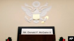 A placard is displayed for former White House Counsel Don McGahn, who did not appear before a House Judiciary Committee hearing, May 21, 2019, on Capitol Hill in Washington.