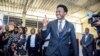 FILE - Independent candidate Venancio Mondlane holds up his finger after casting his vote in general elections in Maputo, Mozambique, Oct. 9, 2024.
