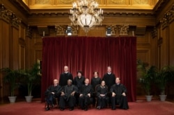FILE - Justices of the U.S. Supreme Court gather for a group portrait, Nov. 30, 2018.