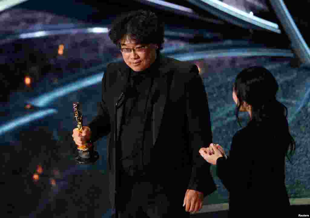 Director Bong Joon-ho accepts the Oscar for Best Foreign Language Film for "Parasite" of South Korea at the 92nd Academy Awards in Los Angeles, Calif., Feb. 9, 2020.