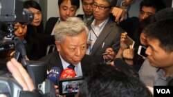 Jin Liqun, president-designate of the Chinese-led Asian Infrastructure Investment Bank (AIIB), talks to reporters after a presentation at the Brookings Institute in Washington, DC, Wednesday, October 21, 2015. (Sophat Soeung/VOA Khmer)