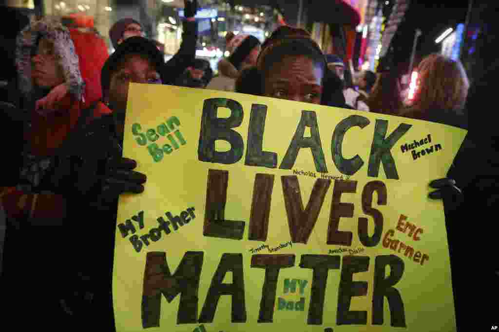 Protestors march against a grand jury's decision not to indict the police officer involved in the death of Eric Garner, Dec. 4, 2014, in New York.