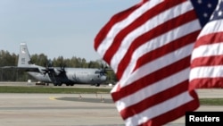 A U.S. Air Force plane is seen at an airport in Riga, Latvia, April 24, 2014.