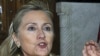 Clinton pide salida de Gadhafi