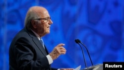 FILE - Sepp Blatter, who was FIFA president at the time, speaks during the preliminary draw for the 2018 World Cup in St. Petersburg, Russia, July 25, 2015. 