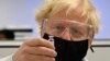 Britain OK's COVID-19 Vaccine - Virus Surges Globally
