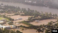 Banjir akibat meluapnya sungai Brisbane di Queenlsand beberapa minggu lalu.