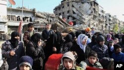 Foto de archivo de 2015 en el pueblo de Beit Sahm, al sur de Damasco, la capital siria, que se vio sacudida por un nuevo atentado terrorista.