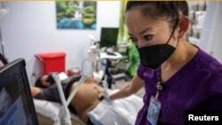 Shelly Tien is one of about 50 doctors who travel around the U.S. to perform abortions. (REUTERS/Evelyn Hockstein)