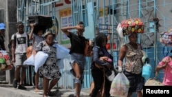 Gangues fazem muita gente abandonar as suas casas, Port-au-Prince