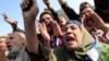 Protesters chant anti-government slogans in Tahrir Square in Cairo, Egypt, November 30, 2012. 