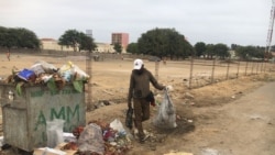 Angola: Da falta de empregos à corrida ao lixo, uma luta pela sobrevivência