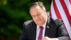 US Secretary of State Mike Pompeo signs an agreement on fifth-generation internet technology with Slovenia's Foreign Minister Anze Logar in Bled, Slovenia, Aug. 13, 2020.