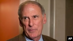 FILE - Sen. Dan Coats, R-Ind. speaks on Capitol Hill in Washington, Dec. 31, 2012. 