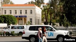 The United Nation vehicle carrying the Organization for the Prohibition of Chemical Weapons (OPCW) inspectors is seen in Damascus, Syria, April 17, 2018.
