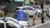 韩国警方在立法委员鲁会灿的自杀现场进行调查，韩国首尔，周一，7月23日，2018。