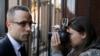 Olympic and Paralympic track star Oscar Pistorius (L) arrives ahead of his trial for the murder of his girlfriend Reeva Steenkamp, at the North Gauteng High Court in Pretoria, May 13, 2014.