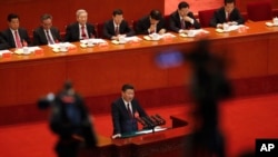 中共总书记习近平在北京人大会堂召开的中共19大开幕式上发表讲话。（2017年10月18日）