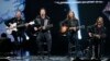 FILE - Imagine Dragons performs during the taping of "The Night That Changed America: A Grammy Salute To The Beatles", which commemorates the 50th anniversary of The Beatles appearance on the Ed Sullivan Show, in Los Angeles January 27, 2014. 
