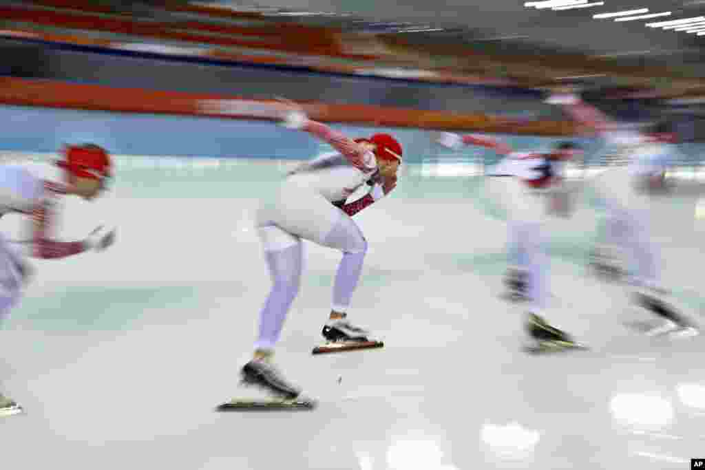 Russian speed skaters train at the Adler Arena Skating Center ahead of the 2014 Winter Olympics in Sochi, Feb. 5, 2014.