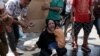 Police Fire Tear Gas as Migrants Demand to Leave Greek Island After Fire