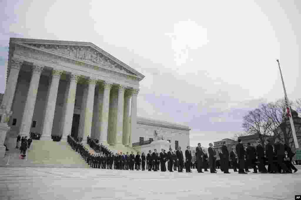 The casket of Supreme Court Justice Antonin Scalia arrives at the Supreme Court in Washington, Feb. 19, 2016.
