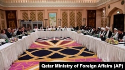 Suasana perundingan perdamaian Taliban dan Afghanistan di Doha, Qatar, 25 Februari 2019. (Foto: Qatar Ministry of Foreign Affairs via AP)