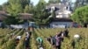(File) workers collect red grapes in vineyards near Bordeaux, France. A warmer world will trigger higher food prices higher, &quot;hotspots of hunger&quot; among the world&#39;s poor, and strain Western delights like wine and robust coffee, a UN report said.