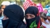 Rohingya Coerced Into Relocating to Remote Island, Refugees and Aid Workers Say 