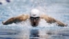 Michael Phelps competes in the 100-meter butterfly at the Indianapolis Grand Prix swimming meet in Indianapolis on March 29, 2012. 